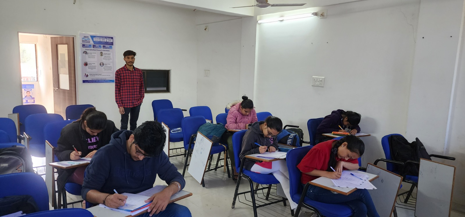 Students Giving Exam at Dev Institute